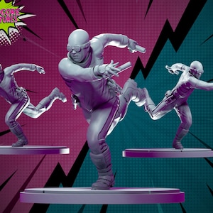 以下が含まれることがあります： ヘルメットとゴーグルを着用した人物のグレーでペイントされたミニチュアフィギュアが3体、それぞれ異なるポーズで走っています。フィギュアは円形のベースの上に置かれています。背景はピンクとターコイズで、白いコミックスタイルの吹き出しに「HARDCORE MINIATURES」と書いてあります。