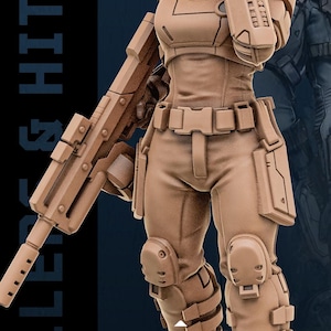 以下が含まれることがあります： ライフルを持っている未来的な兵士のタン色のフィギュア。フィギュアは、保護ギアを備えた詳細なユニフォームを着ています。「KILLERS & HITMEN」というテキストが左側に表示され、下部に「JANUARY RELEASE」と表示されています。
