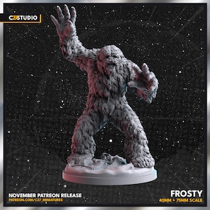 May include: A gray, furry, monster-like creature with a snarling expression, standing on a snowy base. The creature is posed with its arms outstretched, as if in a threatening stance. The base is a circular platform with a snowy texture. The miniature is labeled "FROSTY 40MM + 75MM SCALE".
