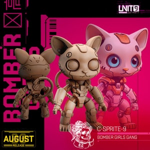 May include: Three robot cat figurines in shades of brown and pink, with mechanical details and large eyes. The text "C-SPRITE-9" and "BOMBER GIRLS GANG" are visible. The background is a mix of black and pink with the text "AUGUST RELEASE".