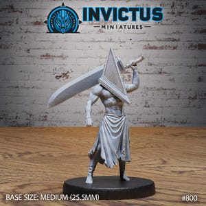May include: A grey, unpainted plastic miniature of a figure wearing a pyramid-shaped helmet and holding a large knife. The figure is standing on a round base. The miniature is labelled "INVICTUS MINIATURES #800 BASE SIZE: MEDIUM (25.5MM)"