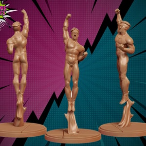 May include: A brown painted miniature figurine of a superhero in a flying pose. The figurine is on a round base and has a raised fist.