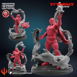 May include: A 3D printed miniature of a figure in a red and black costume with a flowing cape, casting a magical effect. The figure is standing on a base with a swirling, smoke-like effect. The miniature is pre-supported and print tested. The text "TRIDENT STUDIO" is visible in the background.