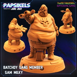 May include: A 3D printed miniature figurine of a large, orange-colored character with a skull on their shirt. The character is holding a gun in one hand and has a mohawk hairstyle. The figurine is standing on a round base with the text "BATCHOY GANG MEMBER SAM MILKY" printed on it. The text "The METAHUMANS BATCHOYS GANG" is printed in the upper right corner of the image.