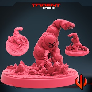 Può includere: Una miniatura in plastica rosa stampata in 3D del personaggio dei fumetti Marvel, The Juggernaut, in una posa di combattimento. La miniatura è su una base rosa con una texture rocciosa. La miniatura fa parte di un set di tre miniature, tutte mostrate nell'immagine.