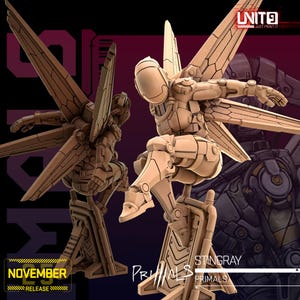 Op de afbeelding: Twee beige, futuristische robotfiguren met vleugelachtige structuren die zich uitstrekken vanaf hun rug. De figuren staan in dynamische poses, wat beweging suggereert. De afbeelding bevat de tekst "UNIT9 JUST PRINT IT", "NOVEMBER RELEASE" en "STINGRAY PRIMALS".