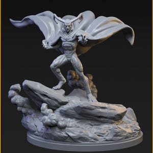 May include: A gray miniature figure of a horned humanoid with a flowing cape, standing on a rocky base with cloud-like formations. The figure is posed dynamically, with text that reads "CHTHON 40mm" and "OCTOBER PATREON RELEASE".