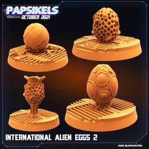 May include: Four 3D printed alien egg models on circular bases with a textured surface. The eggs are in various stages of development, with some showing a honeycomb pattern and others with a more organic, eye-like design. The bases are all the same size and have a grid pattern.
