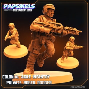 May include: A tan-coloured Colonial Agile Infantry miniature figure, Private Roger Dodger, holding a rifle, with two additional figures in the background. The figure is on a circular base. The text "Papsikels December 2021" is at the top.