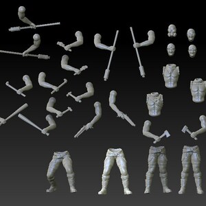 Puede incluir: Un conjunto de figuras en miniatura impresas en 3D, que incluyen torsos, brazos y piernas, con varias armas y herramientas. Las figuras están hechas de plástico gris claro y están en varias poses de acción.