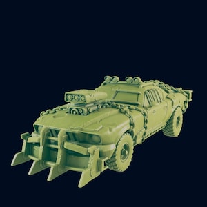 May include: A green, heavily modified, post-apocalyptic style car with a large metal grill and chains. The car has a large engine with multiple exhaust pipes and a large, metal bumper.