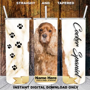 Könnte beinhalten: Drei Edelstahlbecher mit Strohhalmen. Einer zeigt ein Cocker Spaniel-Porträt, ein anderer schwarze Pfotenabdrücke und der dritte den Text "Cocker Spaniel". Alle Becher haben einen Marmorhintergrund. Der Text "STRAIGHT AND TAPERED" steht oben.