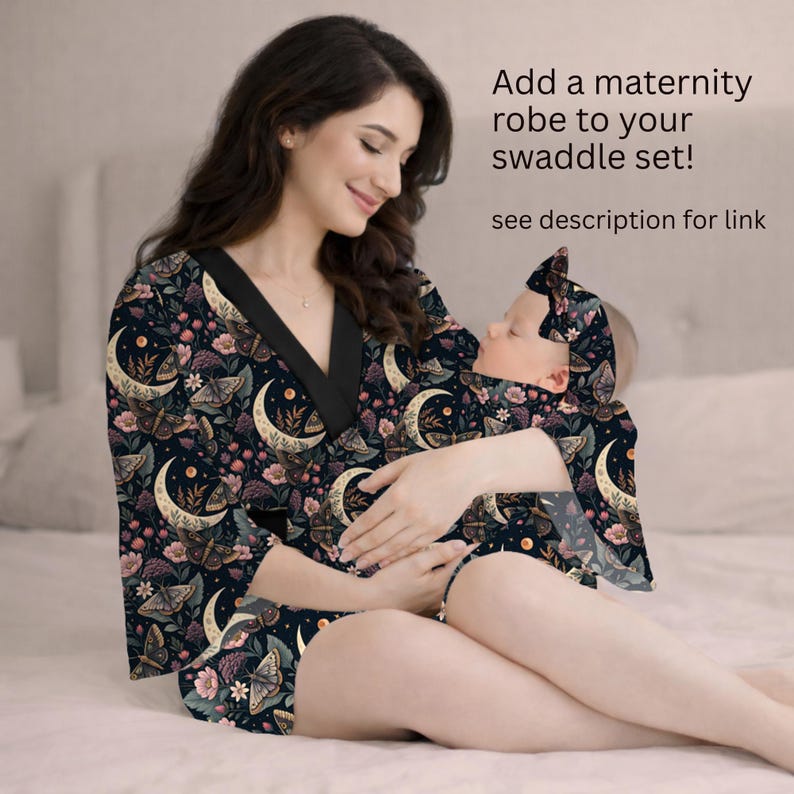 May include: A dark navy maternity robe, swaddle, and headband set with a celestial moth and moon pattern. The robe has a black trim. The text in the image says, "Add a maternity robe to your swaddle set! see description for link."