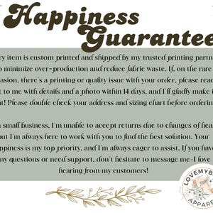 May include: A light green rectangular graphic with the words "Happiness Guarantee" in brown script. The text below details the shop's printing and shipping practices, and customer service policies. The shop's logo is in the bottom right corner.