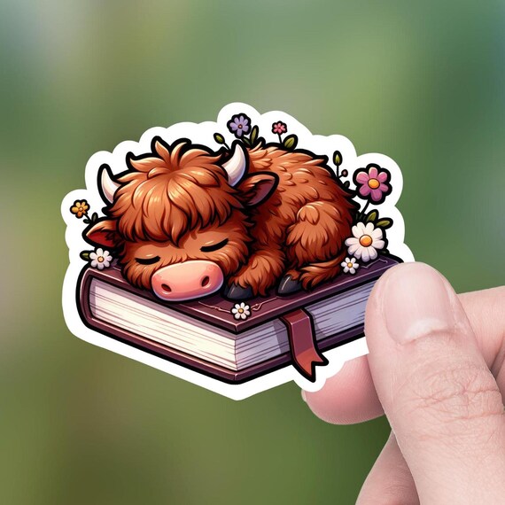 Cute Highland Cow calf sleeping on a Book, Die-Cut Sticker, Hydro Flask Sticker, Tumbler Decal, Lap top Decal, Kindle decal, Water Bottle