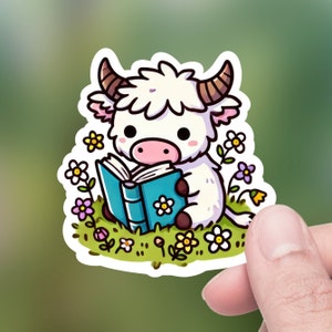 Cute Whtie Highland Cow Reading a Book, Die-Cut Sticker, Hydro Flask Sticker, Tumbler Sticker, Lap top Decal, Kindle Sticker, Bottle Sticker