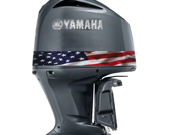 May include: A gray Yamaha outboard motor with an American flag decal. The motor has a black and white Yamaha logo on the top.