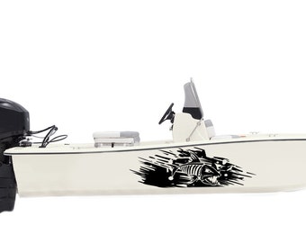 May include: A white boat with a black fish skeleton graphic on the side. The boat has a black outboard motor and a gray seat.