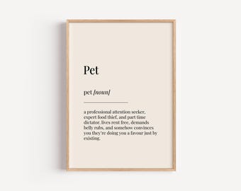 May include: A printable wall art print with a humorous definition of the word "pet". The definition reads: "a professional attention seeker, expert food thief, and part time dictator, lives rent free, demands belly rubs, and somehow convinces you they're doing you a favour just by existing."