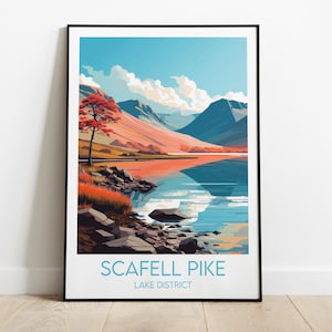 May include: A framed art print featuring a scenic landscape of Scafell Pike in the Lake District. The artwork depicts a lake reflecting the sky and mountains, with a red-leafed tree on the shore. The print has a minimalist style with a color palette of blue, orange, and white.