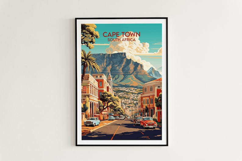 May include: A vintage travel poster featuring a colorful illustration of Cape Town, South Africa. The poster depicts a street scene with buildings, palm trees, and cars, with Table Mountain in the background. The text "CAPE TOWN SOUTH AFRICA" is printed at the top of the poster.