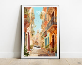 May include: A framed art print showing a watercolour illustration of a street scene in Palma, Spain. The artwork depicts colourful buildings with balconies, potted plants, and a church in the distance. The print is displayed on a wooden floor.