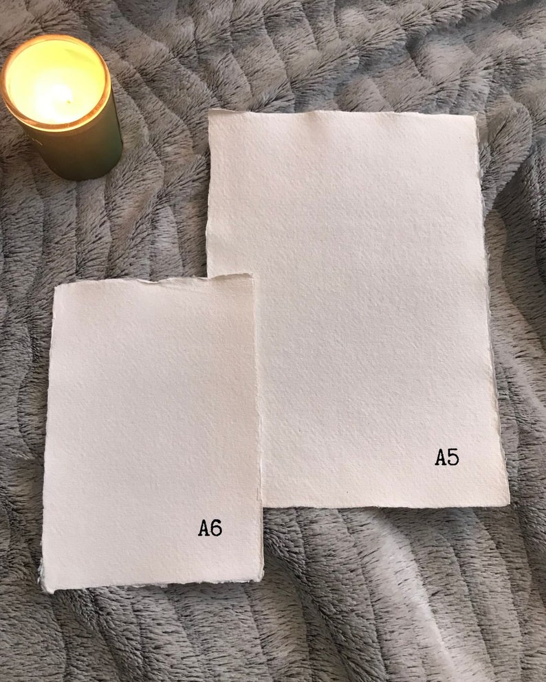 May include: Two pieces of white paper, one labeled "A5" and the other labeled "A6".