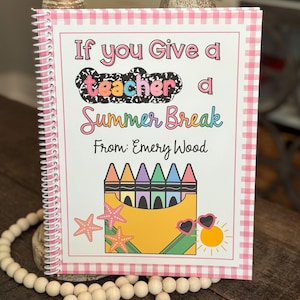 May include: Spiral-bound notebook with a pink and white gingham border. The cover features the text "If you Give a teacher a Summer Break" with crayon and summer-themed illustrations. The notebook is personalized "From: Emery Wood".