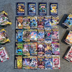 JCC Pokémon : boîte cadeau de 100 | Comprend des boosters, des produits scellés, des cartes, des accessoires et plus encore !!
