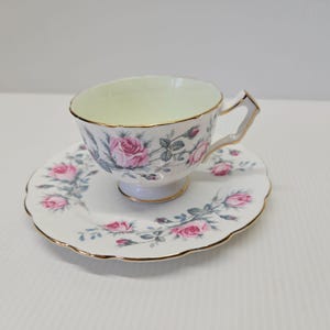 Vintage Aynsley Bone China Tea Cup and Saucer With Pink Roses And Gold Trim