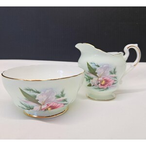 Pot à crème et sucrier Paragon Bone China, orchidée rose, bordure dorée