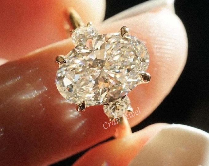 Oval Cut Three Stone Lab Grown Diamond Ring