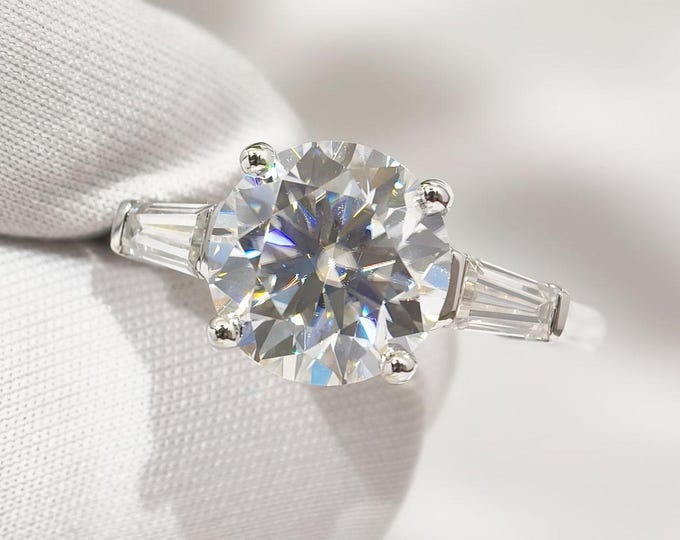 Round Cut Three Stone Moissanite Engagement Ring, Side Tapered Baguette Diamond Anniversary Ring, Past Present Future Promise Ring For Her