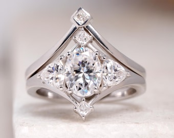 Splint Style Designer Shank Design Oval Cut Moissanite Bridal Ring Set, Sparkling Three Stone Ring With Curved Matching Wedding Band For Her