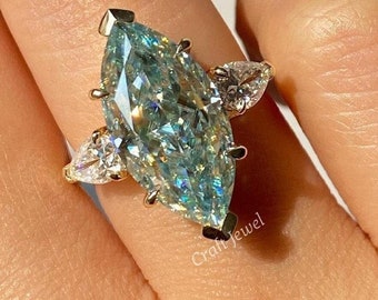 Cyan Blue Marquise Cut Moissanite Diamond Ring With Two Pear Shape Diamond Both The Side Show Strong Relation, Perfect Gift For Partner