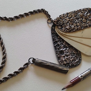 Chatelaine pendant aide memoire bone notepad repousse floral pattern with chain