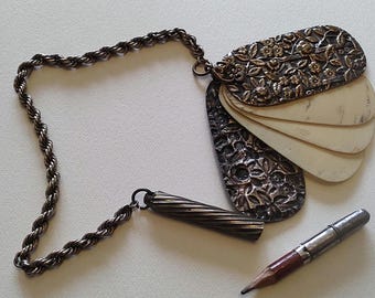 Chatelaine pendant aide memoire bone notepad repousse floral pattern with chain