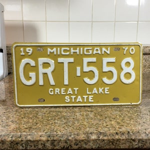 MI Michigan Auto Car Truck License Plate, 1970&#39;s, Great Lake State, Tag # GRT 558, White over Tan for collector display gift