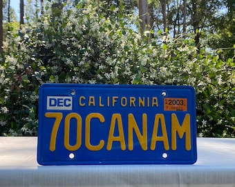Matrícula personalizada vintage de California, etiqueta metálica en relieve n.° 70CANAM, década de 2000