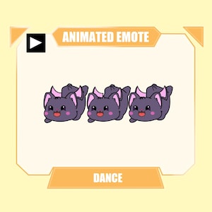 May include: An animated emote featuring three identical dark purple cartoon cats with pink inner ears and rosy cheeks, arranged in a horizontal row. The text "ANIMATED EMOTE" appears at the top and "DANCE" is printed at the bottom of the frame.