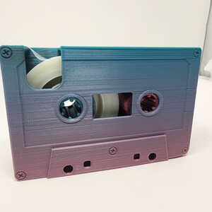 Random color 3d printed cassette tape dispenser with gift included.  *FREE SHIPPING*