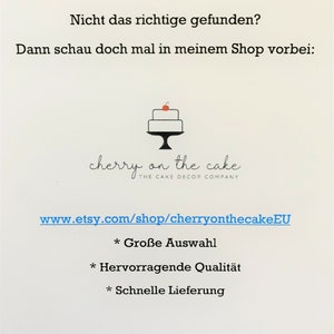 May include: A white card with black text and a cake illustration. The text reads "Nicht das richtige gefunden? Dann schau doch mal in meinem Shop vorbei:" and "cherry on the cake THE CAKE DECOR COMPANY". Includes a website address.