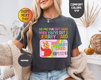 Comforts Colors Having Fun Isn&#39;t Hard When You&#39;ve Got A Library Card Teacher T-Shirt, Teacher Shirt, Librarian Shirt, Book Lovers Gift
