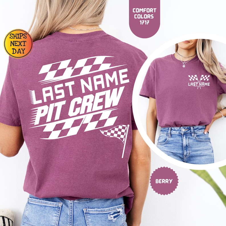May include: A purple t-shirt with a white design on the back that says "LAST NAME PIT CREW" with a checkered flag. The front of the shirt has a smaller checkered flag design with the text "LAST NAME".