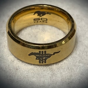 Size 9 Ford Inspired Mustang 8MM Inspired Titanium Gold color ring.