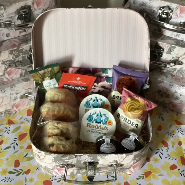 Medium Cream Tea Hamper. Beautiful suitcase box packed with treats. Scones, jams, clotted cream, biscuits, tea & coffee.