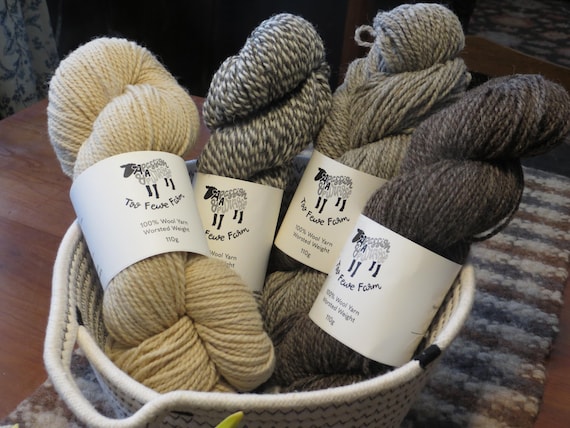 100% wool yarn from Too Fewe Farm available in a variety of our natural (no dyes) colors