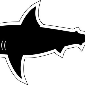 May include: Black silhouette of a shark with a white outline.