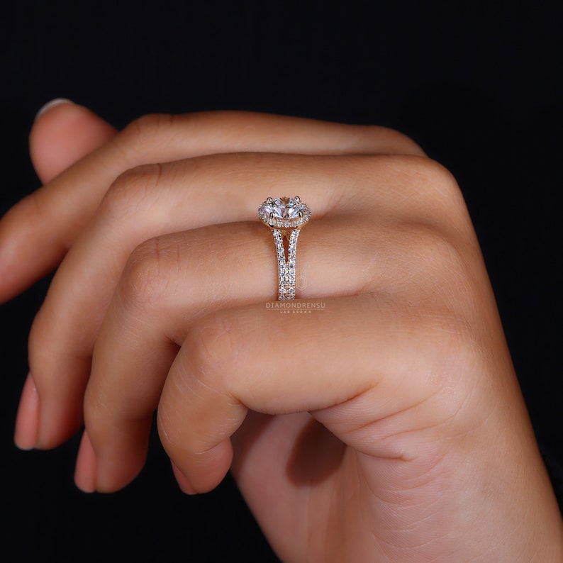 Timeless appeal of a Split Shank Band Halo Ring, designed by Diamondrensu for her special day.