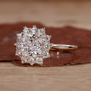 Detailed view of the halo setting on a cushion cut ring, handmade by Diamondrensu